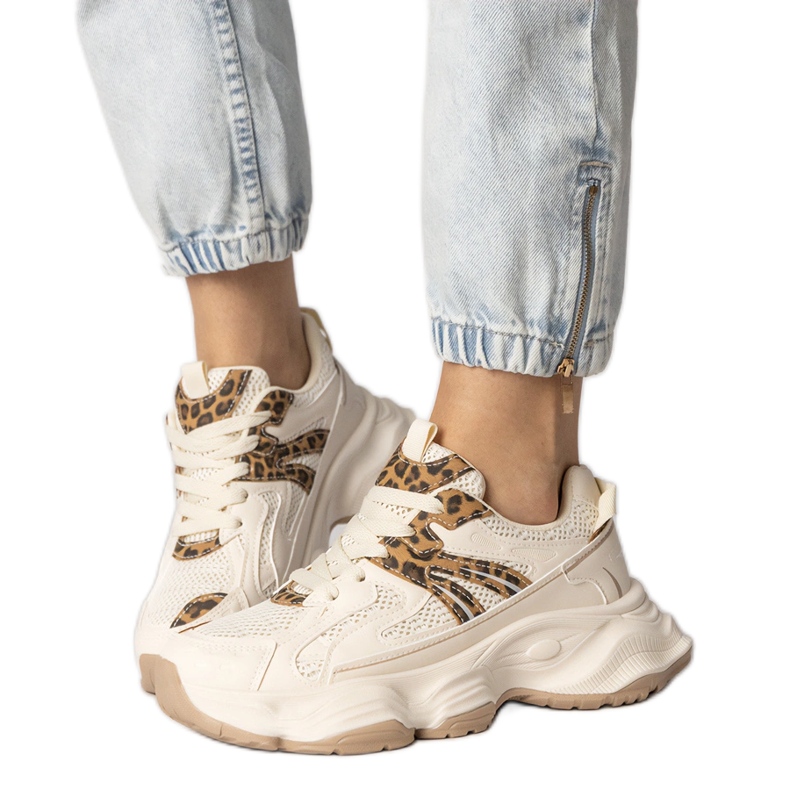 Sneakers beige Sports pour femmes avec un insert léopard Sneakers beige Sports pour femmes avec un insert léopard