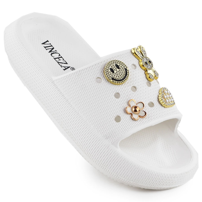 Les tongs en mousse sur la plage de la piscine sur la plate-forme blanche décorée Vinceza 76055