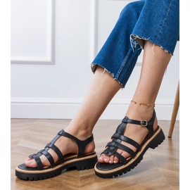 Sandales de gladiateur noir avec une boucle