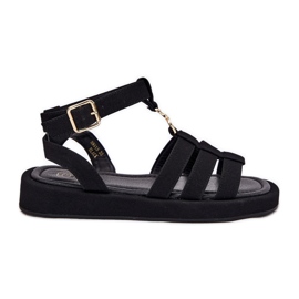 Sandales féminines sur la plate-forme avec un détail doré noir