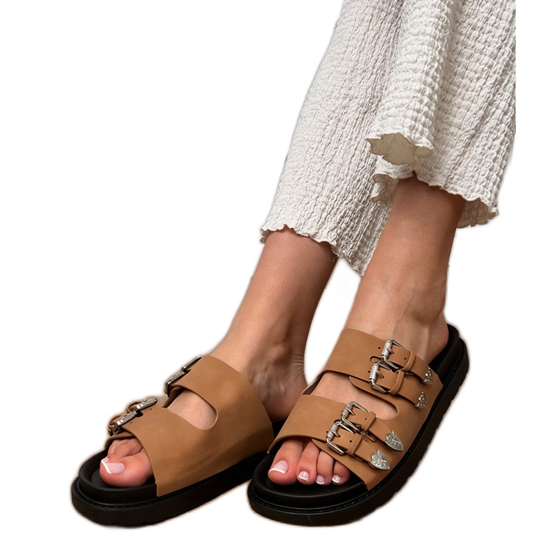 Pantres de femmes brunes avec boucles décoratives beige