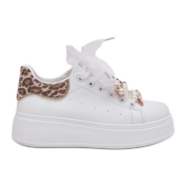 Baskets féminines sur la plate-forme avec épingles léopard blancs blanche Baskets féminines sur la plate-forme avec épingles léopard blancs blanche