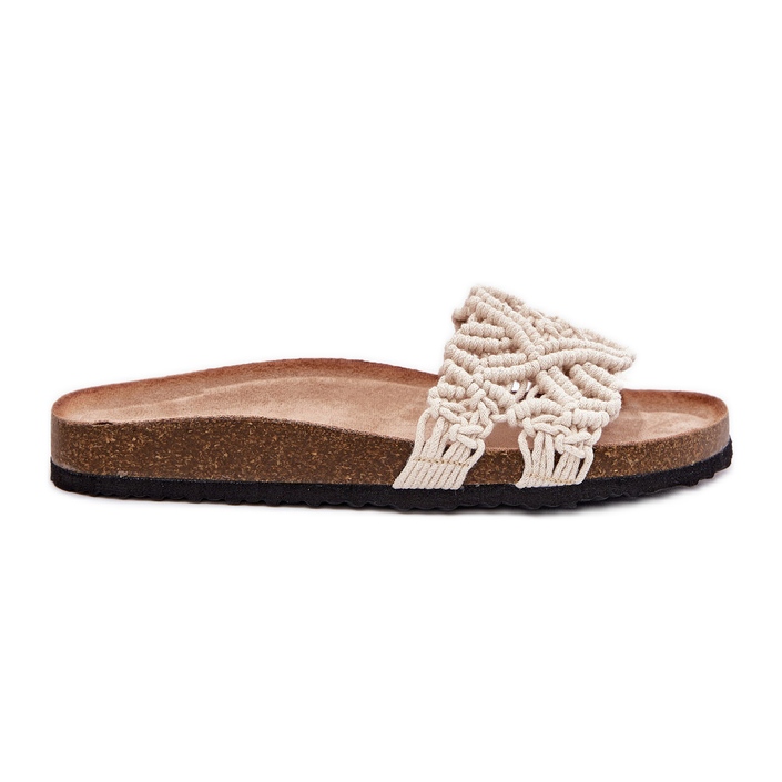 Les tongs pour femmes sur la plate-forme de liège beige