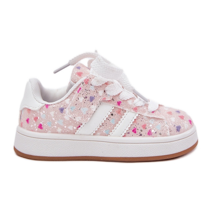 Chaussures de sport des filles brillantes avec des coeurs roses