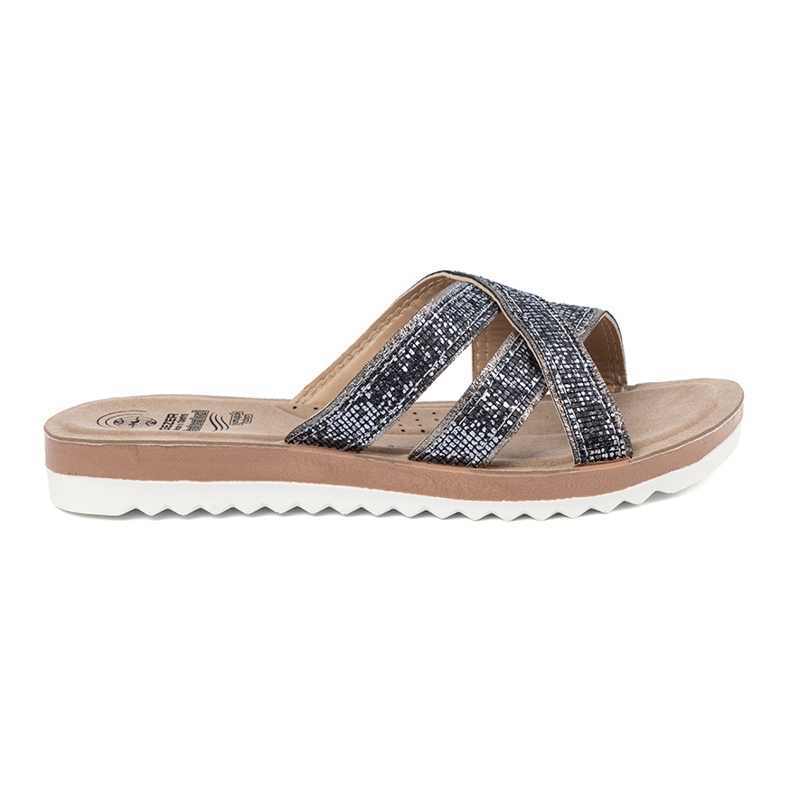Les tongs métalliques pour femmes sur une semelle plate argent