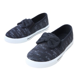 Baskets pour enfants noirs avec un arc le noir