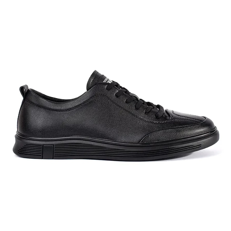 Baskets masculines à faible équipe le noir