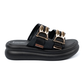 Seastar Pantoufles avec boucles dorées sur la plate-forme noir