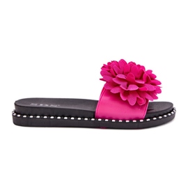 Les tongs pour femmes décorés de fleurs fuchsia rose Les tongs pour femmes décorés de fleurs fuchsia rose