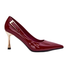 Talons vernis avec une pince bordeaux dorée rouge