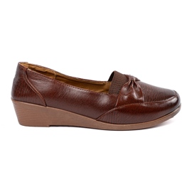 Chaussures basse brunes avec un arc
