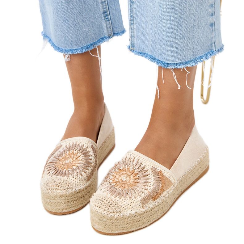 Espadrilles beige avec broderie sur la plate-forme Lorin