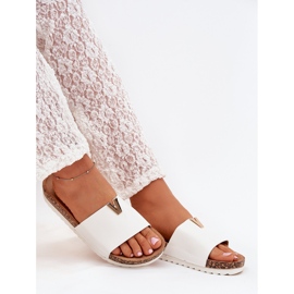 Boto Les tongs pour femmes sur une plate-forme en liège avec un détail décoratif de vesira blanc