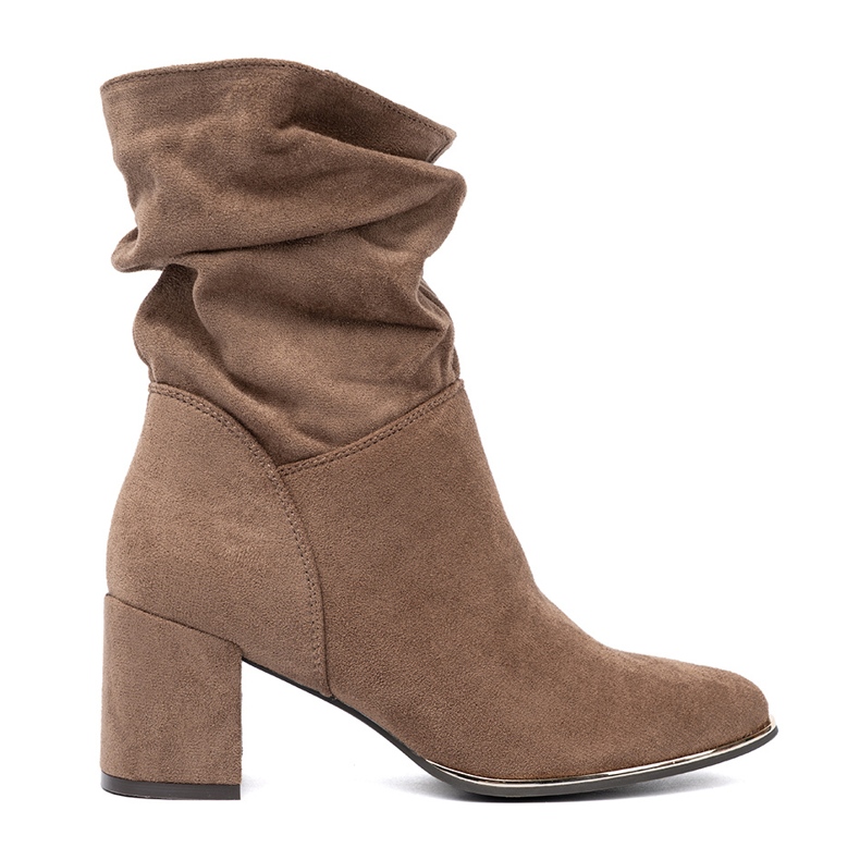 Shelvt Bottes en daim beige sombres sur le poteau
