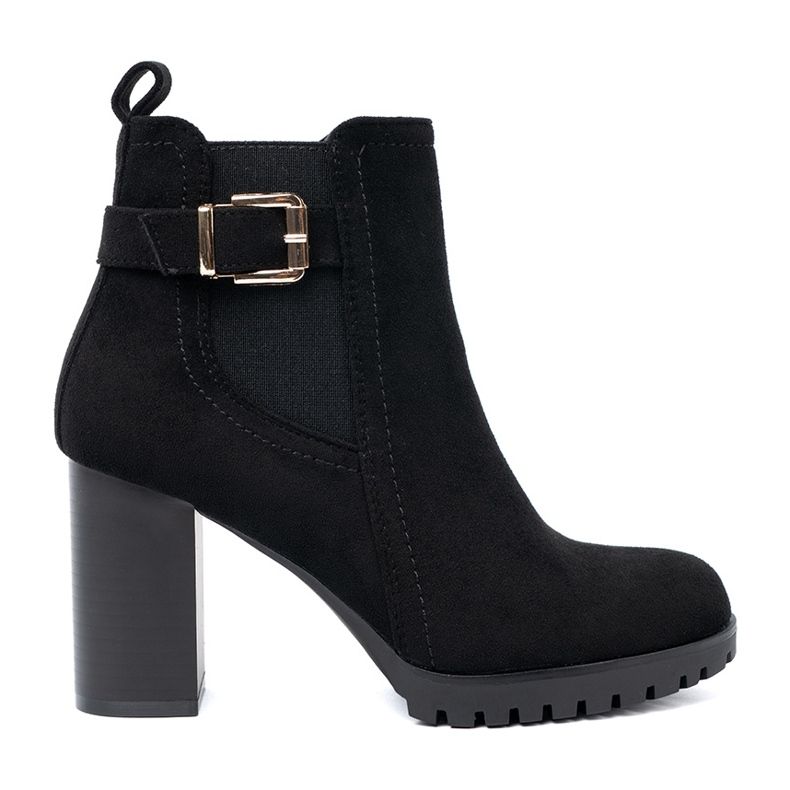 Shelvt Bottes noires sur le poteau avec une pince décorative le noir
