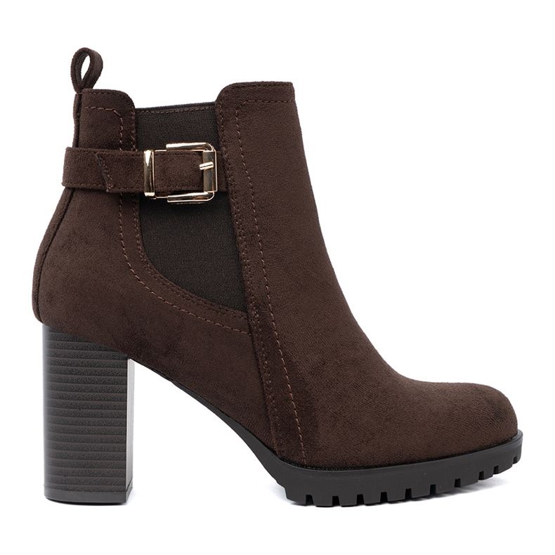 Shelvt Bottes brun foncé sur le poteau avec une pince décorative