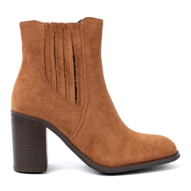 Shelvt Bottes de caramel sur le poste de daim écologique