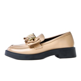 Mocassins beige avec un arc et un ours de teriwa