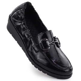 Chaussures en cuir pour femmes laquées sur des cales Black Rieker L5352-00