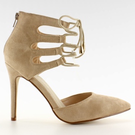 Talons en daim noués à la cheville beige