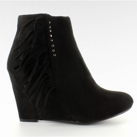 Bottes en daim sur un coin à franges Noir le noir