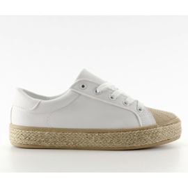 Baskets sur la semelle en toile blanche NA05P