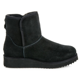 Coco Perla Mukluki sur la plate-forme noir