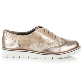 Kylie Brogues dorées sur la reliure d'or