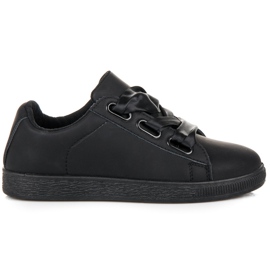 Baskets élégantes avec un ruban noir