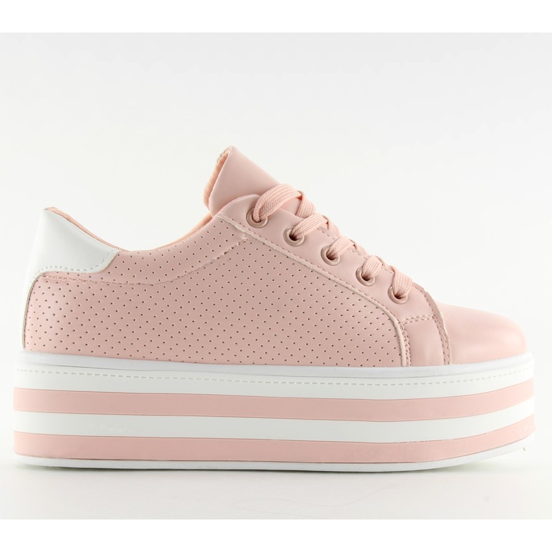 Baskets roses roses sur une semelle haute