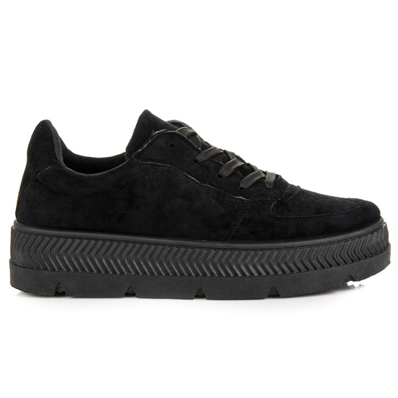 Baskets en daim sur la plateforme le noir