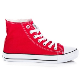 Baskets nouées au-dessus de la cheville rouge