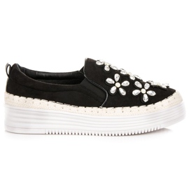 Espadrilles sur la plate-forme des vices le noir
