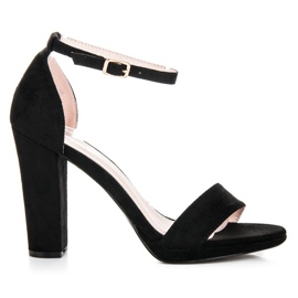 Primavera Sandales en daim sur un bar noir