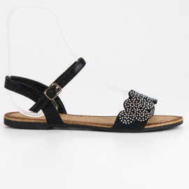 Comer Sandales plates fermées par une boucle noir