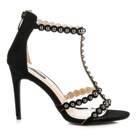 Vices élégants de sandales à talons hauts noir