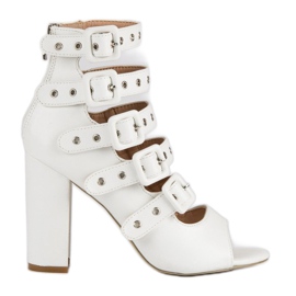 Sandales rock sur le poteau des vices blanc