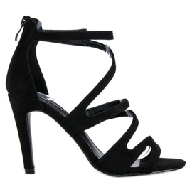 Sandales en daim sur un talon haut noir