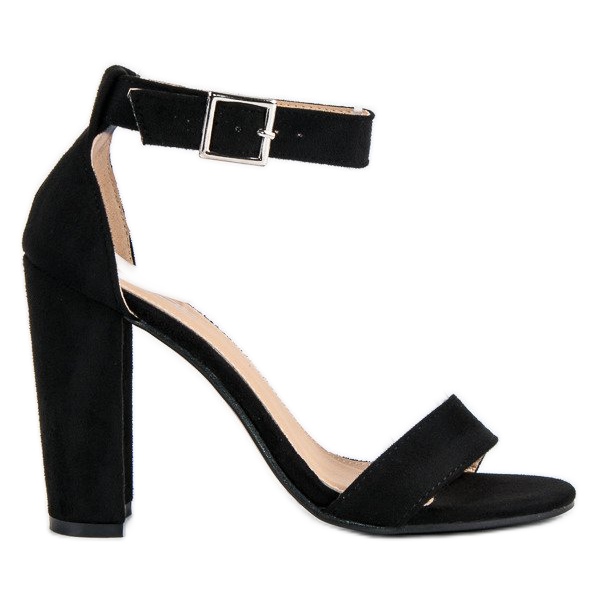 Sandales classiques sur un bar le noir