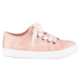 Baskets à la mode avec une fixation rose