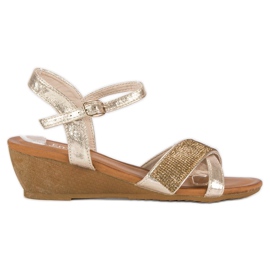 Sandales compensées dorées