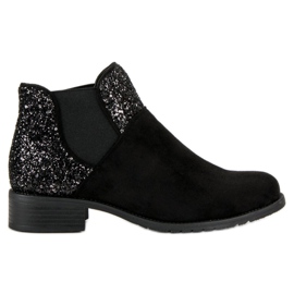 Bottines en daim à talon plat le noir