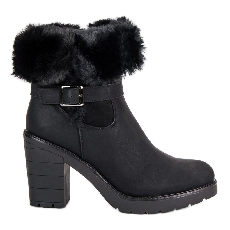 Bottes chaudes sur le poste le noir Bottes chaudes sur le poste le noir