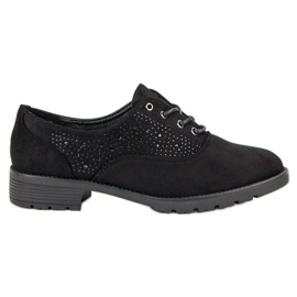 Chaussures en daim noires le noir