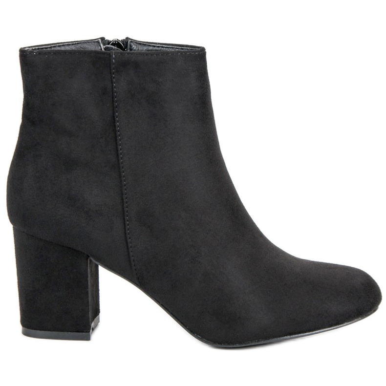 Mannika Bottines en daim sur un bar le noir
