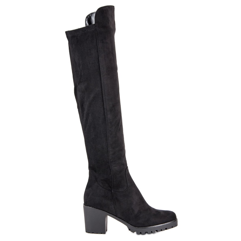 Filippo Bottes en daim sur un pilier le noir