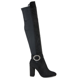 Seastar Cuissardes noires sur un poteau le noir