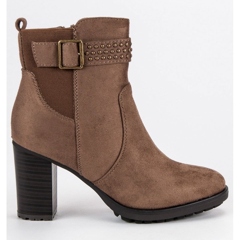 Super Me Bottines en daim sur un bar brun