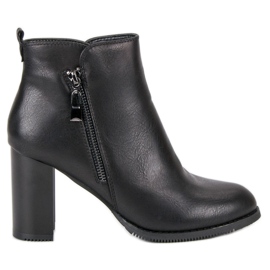 Super Mode Bottines noires à talons le noir