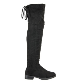 Cuissardes noires sur un talon plat
